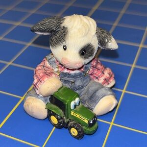 Adorable Cow Figurine with Tractor